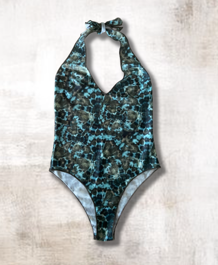 Halterneck swimsuit in tan-through material for a more even tan and quick-dry effect for a more comfortable day at the beach.